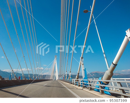 Driving Rion-Antirion Bridge mountain road, Greece 95307399