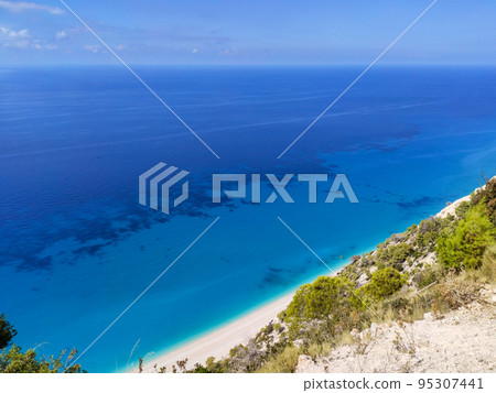 Lefkada sea shore cliffs and turquoise water view Lefkada sea shore cliffs and turquoise water view 95307441