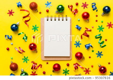 Christmas blank greeting card mock-up scene. Creative layout made of Christmas tree branches and paper card note. Flat lay. Nature New Year concept Christmas blank greeting card mock-up scene. Creative layout made of Christmas tree branches and paper card note. Flat lay. Nature New Year concept 95307616