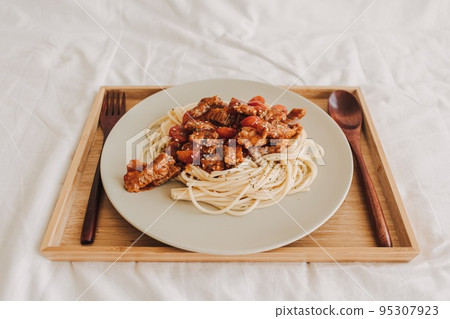 Homemade Beef Spaghetti with sauce served on dish. Homemade Beef Spaghetti with sauce served on dish. 95307923