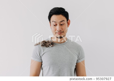 Cute little sugar glider pet hold on the man owner isolated on white. Cute little sugar glider pet hold on the man owner isolated on white. 95307927