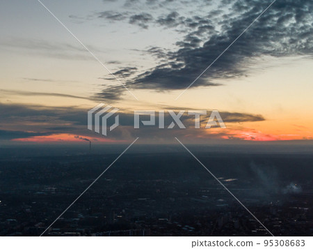 Aerial industrial city sunset evening, epic clouds Aerial industrial city sunset evening, epic clouds 95308683