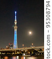 Tokyo Skytree and full moon lit up in blue 95308794