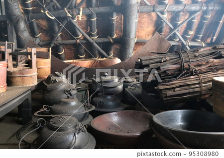 Attic in palm-stone building 95308980