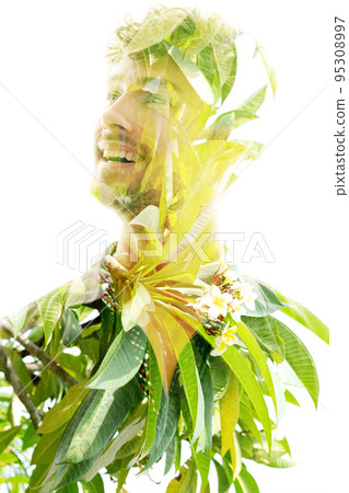Tropical tree combined with a portrait of a smiling man Tropical tree combined with a portrait of a smiling man 95308997