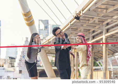 Competitive person race to be first place winner. Multiethnic diversity people contest. Business competition group of business people in formal suit run to finish line success goal victory concept 95309540