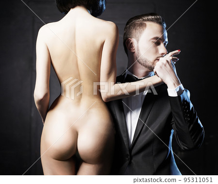 Fashion studio photo of a sensual couple 95311051