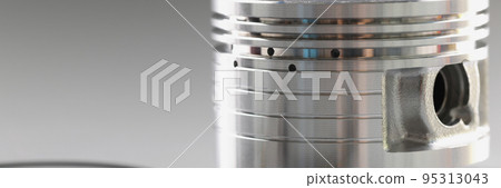 Silver round part of the engine piston, close-up Silver round part of the engine piston, close-up 95313043