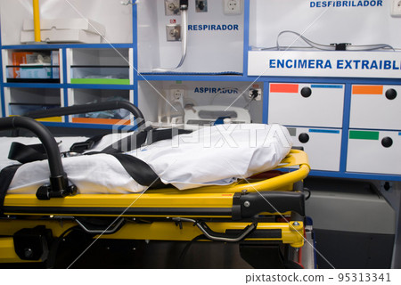 ambulance perfectly equipped with emergency equipment and dummy for first aid practices ambulance perfectly equipped with emergency equipment and dummy for first aid practices 95313341