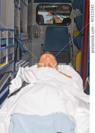 ambulance perfectly equipped with emergency equipment and dummy for first aid practices ambulance perfectly equipped with emergency equipment and dummy for first aid practices 95313342