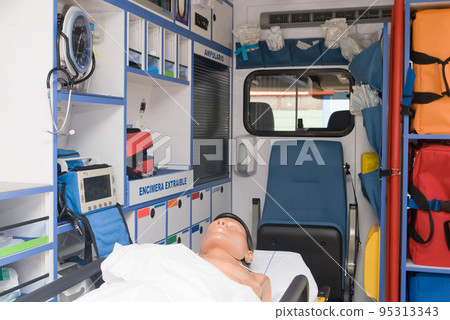 ambulance perfectly equipped with emergency equipment and dummy for first aid practices 95313343