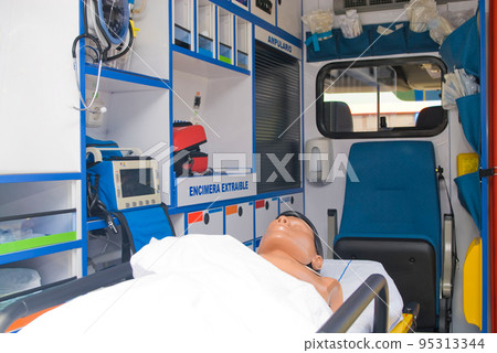ambulance perfectly equipped with emergency equipment and dummy for first aid practices 95313344