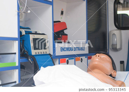 ambulance perfectly equipped with emergency equipment and dummy for first aid practices 95313345