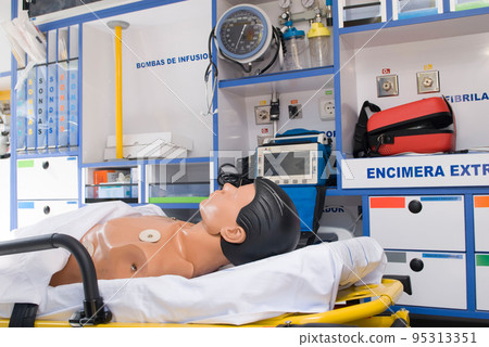 ambulance perfectly equipped with emergency equipment and dummy for first aid practices 95313351