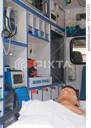 ambulance perfectly equipped with emergency equipment and dummy for first aid practices ambulance perfectly equipped with emergency equipment and dummy for first aid practices 95313355