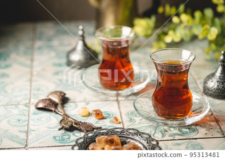 Turkish tea in traditional glass Turkish tea in traditional glass 95313481