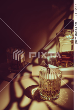 Whiskey with ice in glasses 95313484