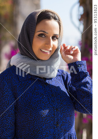 Portrait of smiling young Muslim woman 95313823