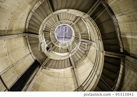 Spiral staircase looking up from below Spiral staircase looking up from below 95313841