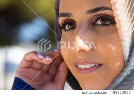 Close-up of smiling Muslim woman Close-up of smiling Muslim woman 95313955
