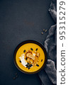 Pumpkin cream soup top view copy space 95315279