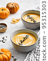 Pumpkin puree soup, autumn healthy season dish 95315303