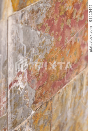 Stone slate colorful tile with grunge weathered natural textured surface Stone slate colorful tile with grunge weathered natural textured surface 95315445