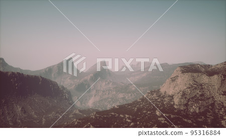 Rocks and mountains in deep fog 95316884