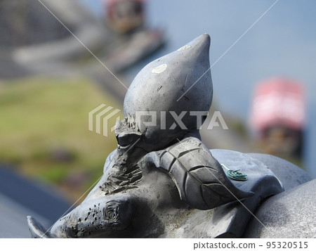 Inuyama Castle and peach tiles Inuyama Castle and peach tiles 95320515