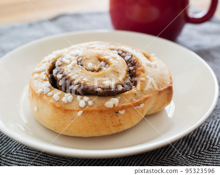 Cinnamon rolls and hot coffee 95323596