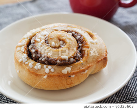 Cinnamon rolls and hot coffee Cinnamon rolls and hot coffee 95323602