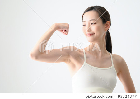 Beautiful Asian woman doing muscle training etc. Beautiful Asian woman doing muscle training etc. 95324377
