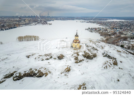 Winter view of the embankment of the city of Nizhny Tagil and the metallurgical plant from above. Environmental problem of environmental pollution and air in large cities 95324840