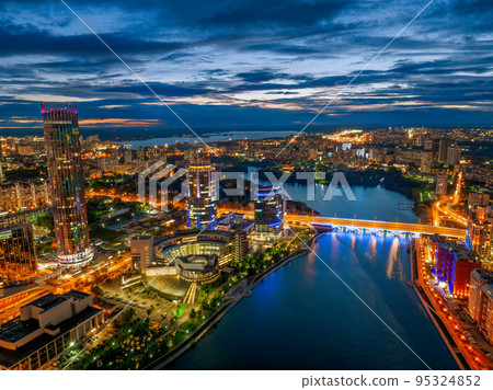 Yekaterinburg city and pond aerial panoramic view at summer or early autumn night. Night city in the early autumn or summer. 95324852