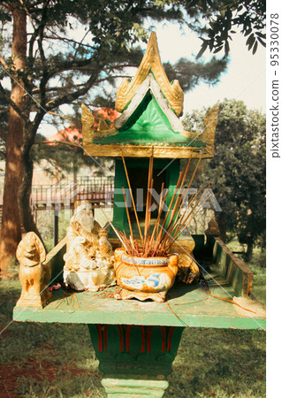 A wooden spirit house or tope taveda in khmer, believed to be a shrine to the protective spirit of a place 95330078