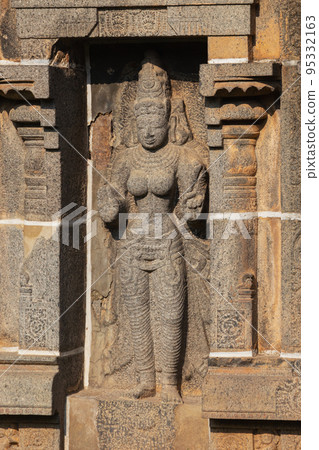 Carved Idol with blessing hands on Gopuram of Nataraja Temple, Chidambaram, Tamil Nadu, India 95332163