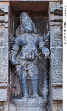 Carved Idol of Kuber on wall of Nataraja Temple, Chidambaram, Tamilnadu, India 95332278