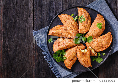 empanadas, fried hand pie with boiled egg filling 95334093
