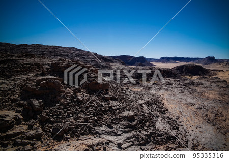 Aerial panoramic view to El Berdj mountain and erg gorge in Tassili nAjjer national park, Algeria 95335316