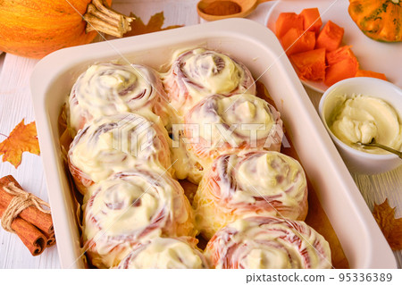 Homemade Pumpkin cinnamon rolls with cream cheese Homemade Pumpkin cinnamon rolls with cream cheese 95336389