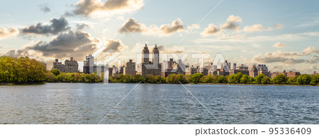 Skyline panorama with Eldorado building and reservoir with fountain in Central Park in midtown Manhattan in New York City 95336409