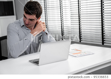 The exhausted office worker who was once competent is now confused. 95336653