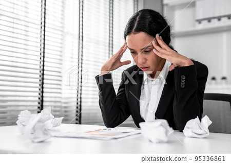A competent female employee who has become completely exhausted from overwork. A competent female employee who has become completely exhausted from overwork. 95336861