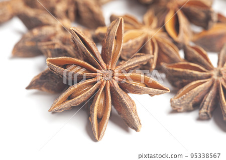 Star anises isolated on white background. Dried star anise spice fruits Star anises isolated on white background. Dried star anise spice fruits 95338567