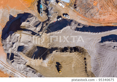 This is panoramic view stone crushing equipment along mechanical conveyor belt that is used stone to make gravel for road construction This is panoramic view stone crushing equipment along mechanical conveyor belt that is used stone to make gravel for road construction 95340675