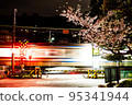 Cherry blossoms and railroad crossing 95341944