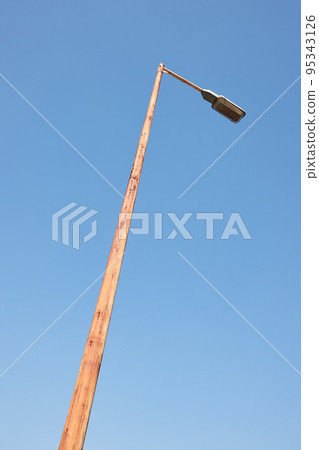 Lamp post on a street 95343126