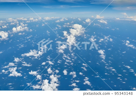Flying above ocean and clouds 95343148