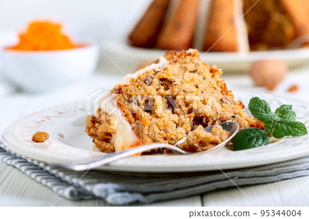 Piece of delicious carrot cake. 95344004