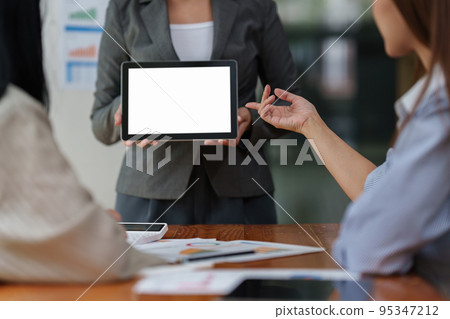 Asian Business consulting meeting and brainstorming new business plan finance investment Asian Business consulting meeting and brainstorming new business plan finance investment 95347212